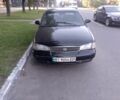 Чорний Кіа Кларус, об'ємом двигуна 2 л та пробігом 300 тис. км за 1254 $, фото 1 на Automoto.ua