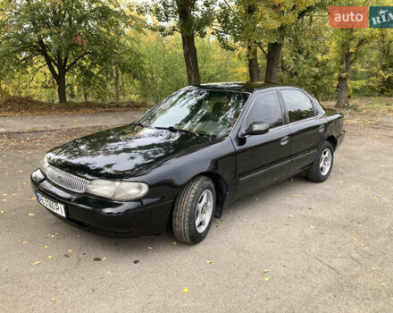 Чорний Кіа Кларус, об'ємом двигуна 2 л та пробігом 493 тис. км за 1850 $, фото 1 на Automoto.ua
