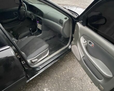 Чорний Кіа Кларус, об'ємом двигуна 2 л та пробігом 300 тис. км за 1600 $, фото 9 на Automoto.ua