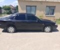 Чорний Кіа Кларус, об'ємом двигуна 2 л та пробігом 200 тис. км за 961 $, фото 1 на Automoto.ua