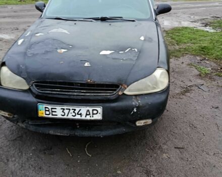 Черный Киа Кларус, объемом двигателя 1.8 л и пробегом 200 тыс. км за 650 $, фото 1 на Automoto.ua