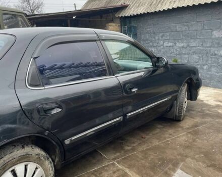 Черный Киа Кларус, объемом двигателя 2 л и пробегом 310 тыс. км за 1750 $, фото 1 на Automoto.ua