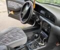 Чорний Кіа Кларус, об'ємом двигуна 2 л та пробігом 250 тис. км за 2246 $, фото 4 на Automoto.ua