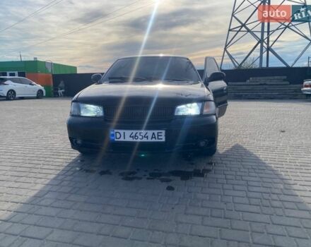 Черный Киа Кларус, объемом двигателя 1.98 л и пробегом 309 тыс. км за 1900 $, фото 1 на Automoto.ua