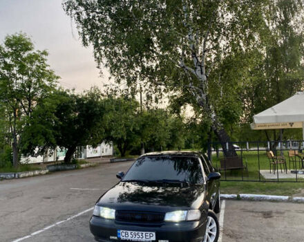 Черный Киа Кларус, объемом двигателя 1.8 л и пробегом 235 тыс. км за 2500 $, фото 1 на Automoto.ua