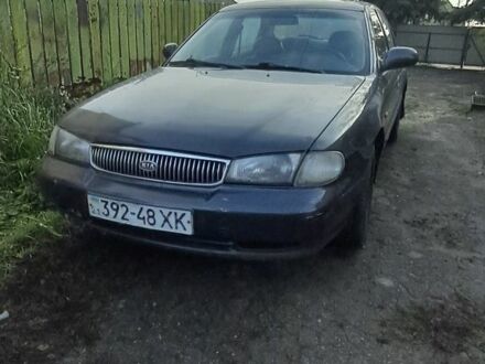 Чорний Кіа Кларус, об'ємом двигуна 2 л та пробігом 250 тис. км за 850 $, фото 1 на Automoto.ua