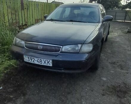 Чорний Кіа Кларус, об'ємом двигуна 2 л та пробігом 250 тис. км за 850 $, фото 1 на Automoto.ua