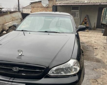 Черный Киа Кларус, объемом двигателя 2 л и пробегом 310 тыс. км за 1750 $, фото 1 на Automoto.ua