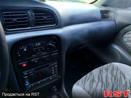 Чорний Кіа Кларус, об'ємом двигуна 2 л та пробігом 218 тис. км за 2700 $, фото 1 на Automoto.ua