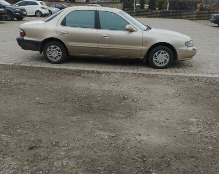 Коричневый Киа Кларус, объемом двигателя 2 л и пробегом 232 тыс. км за 1700 $, фото 1 на Automoto.ua