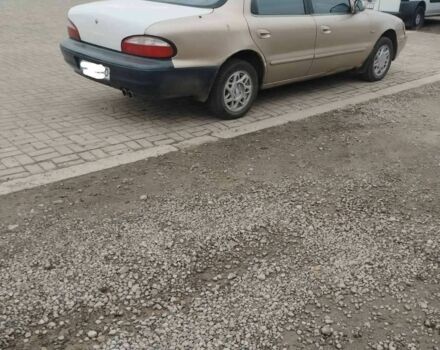 Коричневый Киа Кларус, объемом двигателя 2 л и пробегом 232 тыс. км за 1700 $, фото 2 на Automoto.ua