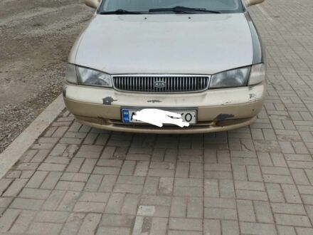 Коричневый Киа Кларус, объемом двигателя 2 л и пробегом 232 тыс. км за 1700 $, фото 1 на Automoto.ua