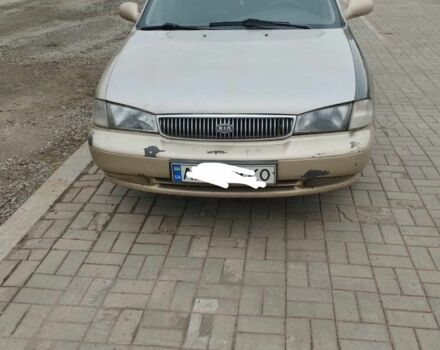 Коричневый Киа Кларус, объемом двигателя 2 л и пробегом 232 тыс. км за 1700 $, фото 1 на Automoto.ua