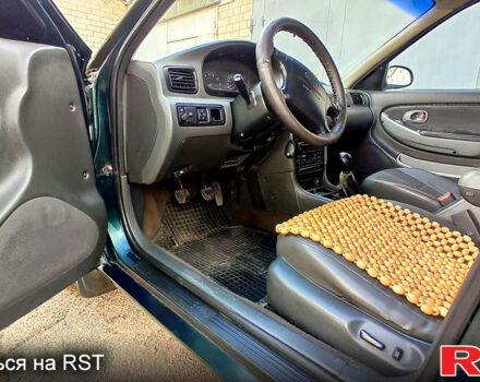 Кіа Кларус, об'ємом двигуна 2 л та пробігом 310 тис. км за 2400 $, фото 5 на Automoto.ua