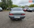 Серый Киа Кларус, объемом двигателя 2 л и пробегом 299 тыс. км за 1450 $, фото 2 на Automoto.ua