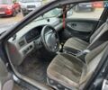 Серый Киа Кларус, объемом двигателя 2 л и пробегом 299 тыс. км за 1450 $, фото 3 на Automoto.ua