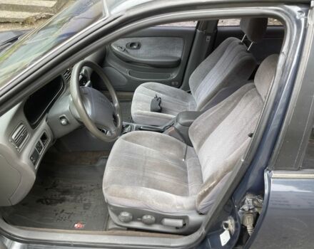 Сірий Кіа Кларус, об'ємом двигуна 2 л та пробігом 350 тис. км за 951 $, фото 4 на Automoto.ua