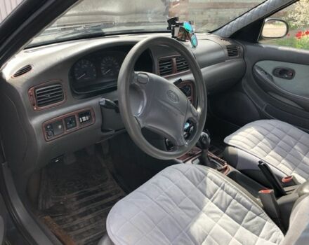 Серый Киа Кларус, объемом двигателя 2 л и пробегом 247 тыс. км за 2990 $, фото 2 на Automoto.ua