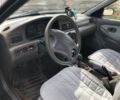 Серый Киа Кларус, объемом двигателя 2 л и пробегом 247 тыс. км за 2990 $, фото 2 на Automoto.ua