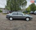 Серый Киа Кларус, объемом двигателя 2 л и пробегом 299 тыс. км за 1450 $, фото 9 на Automoto.ua