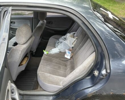 Сірий Кіа Кларус, об'ємом двигуна 2 л та пробігом 350 тис. км за 951 $, фото 5 на Automoto.ua