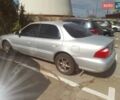 Серый Киа Кларус, объемом двигателя 2 л и пробегом 360 тыс. км за 1800 $, фото 1 на Automoto.ua