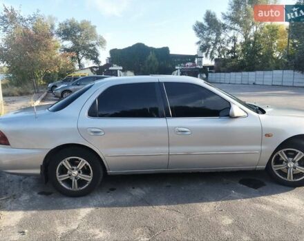 Сірий Кіа Кларус, об'ємом двигуна 2 л та пробігом 352 тис. км за 2000 $, фото 7 на Automoto.ua