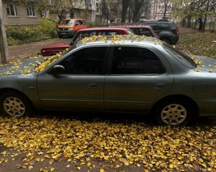 Серый Киа Кларус, объемом двигателя 2 л и пробегом 360 тыс. км за 1191 $, фото 5 на Automoto.ua