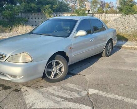 Серый Киа Кларус, объемом двигателя 2 л и пробегом 352 тыс. км за 2000 $, фото 8 на Automoto.ua