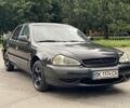 Серый Киа Кларус, объемом двигателя 2 л и пробегом 409 тыс. км за 1550 $, фото 1 на Automoto.ua