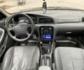 Серый Киа Кларус, объемом двигателя 2 л и пробегом 409 тыс. км за 1550 $, фото 10 на Automoto.ua