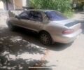 Серый Киа Кларус, объемом двигателя 2 л и пробегом 350 тыс. км за 899 $, фото 2 на Automoto.ua