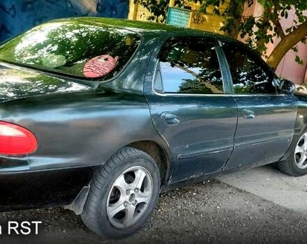 Кіа Кларус 1998 у Запоріжжя на Automoto.ua Сірий Кіа Кларус, об'ємом двигуна 2 л та пробігом 100 тис. км за 2300 $, фото 2 на Automoto.ua