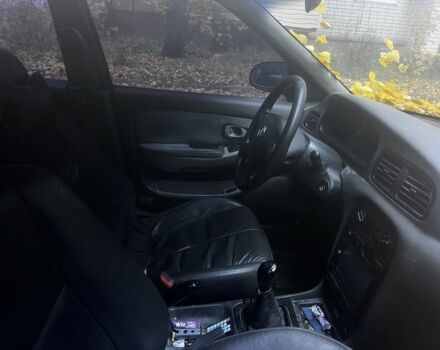 Серый Киа Кларус, объемом двигателя 2 л и пробегом 360 тыс. км за 1191 $, фото 7 на Automoto.ua