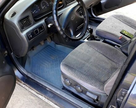 Кіа Кларус 1998 у Запоріжжя на Automoto.ua Сірий Кіа Кларус, об'ємом двигуна 2 л та пробігом 100 тис. км за 2300 $, фото 7 на Automoto.ua