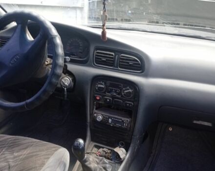 Сірий Кіа Кларус, об'ємом двигуна 2 л та пробігом 300 тис. км за 1300 $, фото 1 на Automoto.ua