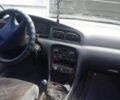 Серый Киа Кларус, объемом двигателя 2 л и пробегом 300 тыс. км за 800 $, фото 1 на Automoto.ua