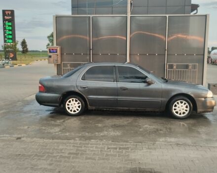 Серый Киа Кларус, объемом двигателя 2 л и пробегом 250 тыс. км за 1600 $, фото 1 на Automoto.ua