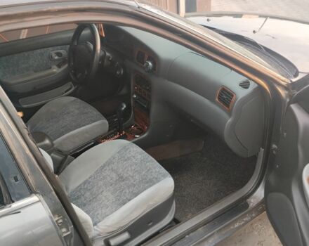 Серый Киа Кларус, объемом двигателя 2 л и пробегом 250 тыс. км за 1600 $, фото 3 на Automoto.ua