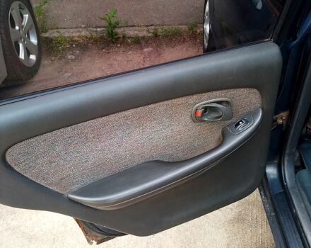 Кіа Кларус 1998 у Запоріжжя на Automoto.ua Сірий Кіа Кларус, об'ємом двигуна 2 л та пробігом 100 тис. км за 2300 $, фото 10 на Automoto.ua