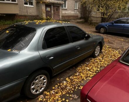 Серый Киа Кларус, объемом двигателя 2 л и пробегом 360 тыс. км за 1191 $, фото 3 на Automoto.ua