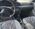 Серый Киа Кларус, объемом двигателя 2.05 л и пробегом 200 тыс. км за 1600 $, фото 1 на Automoto.ua