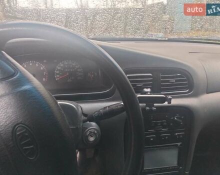 Сірий Кіа Кларус, об'ємом двигуна 2 л та пробігом 352 тис. км за 2000 $, фото 14 на Automoto.ua