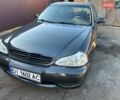 Сірий Кіа Кларус, об'ємом двигуна 2 л та пробігом 413 тис. км за 1680 $, фото 19 на Automoto.ua