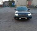 Серый Киа Кларус, объемом двигателя 2 л и пробегом 300 тыс. км за 1000 $, фото 1 на Automoto.ua