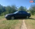 Серый Киа Кларус, объемом двигателя 2 л и пробегом 294 тыс. км за 1800 $, фото 1 на Automoto.ua