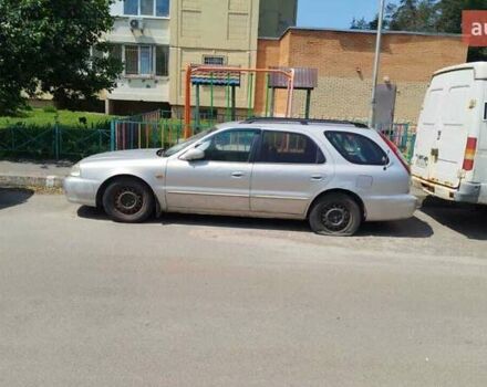 Серый Киа Кларус, объемом двигателя 2 л и пробегом 138 тыс. км за 2200 $, фото 2 на Automoto.ua