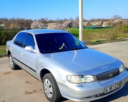 Серый Киа Кларус, объемом двигателя 2 л и пробегом 111 тыс. км за 1300 $, фото 1 на Automoto.ua