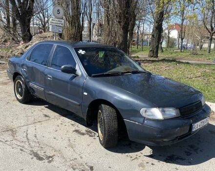 Серый Киа Кларус, объемом двигателя 2 л и пробегом 170 тыс. км за 1311 $, фото 1 на Automoto.ua