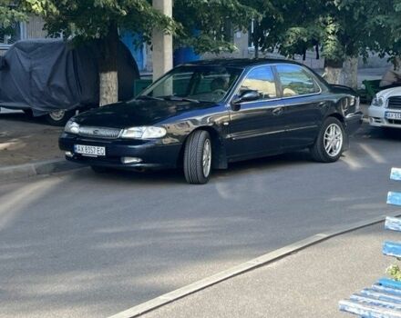 Сірий Кіа Кларус, об'ємом двигуна 2 л та пробігом 247 тис. км за 2990 $, фото 1 на Automoto.ua